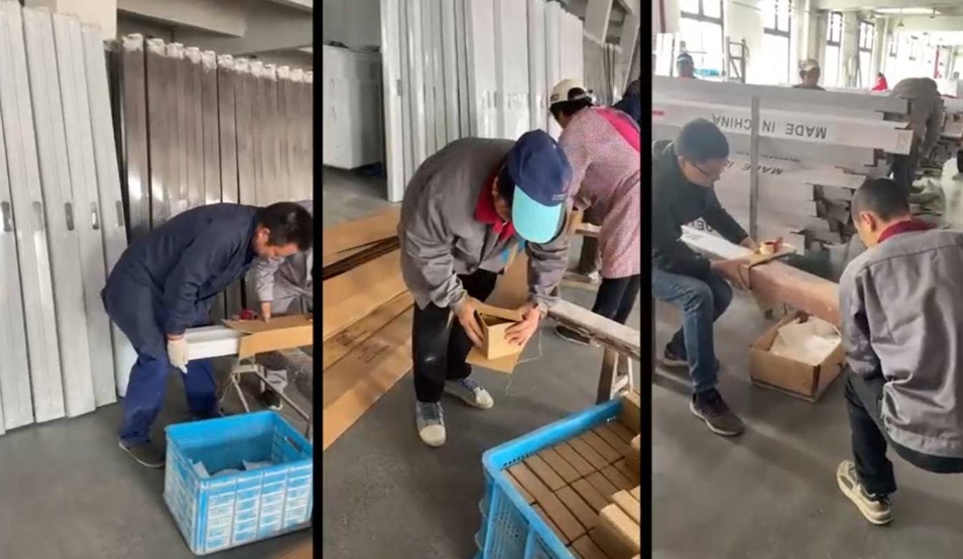 Factory team packing finished building-material products