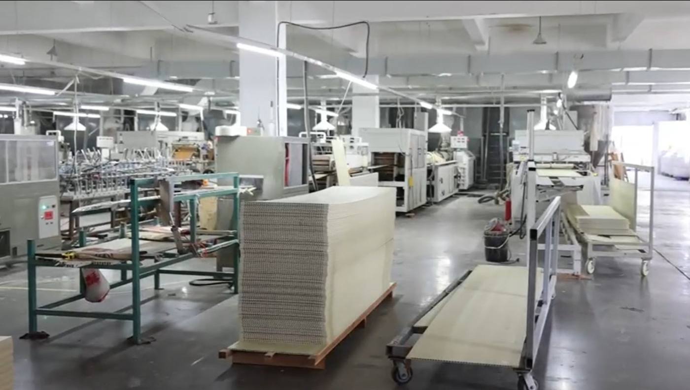 PVC building-material production line inside the Home Plus factory