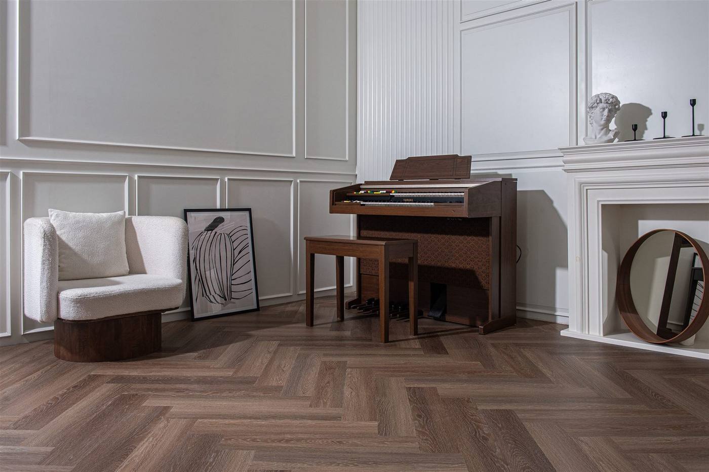 Dark Herringbone Application Warm wood-grain SPC flooring in a classic interior by Home Plus Materials