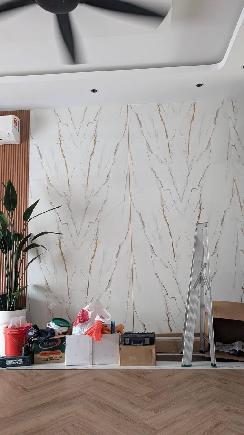 Wall Installation Site White marble-pattern UV sheets installed as a full-height feature wall by Home Plus Materials